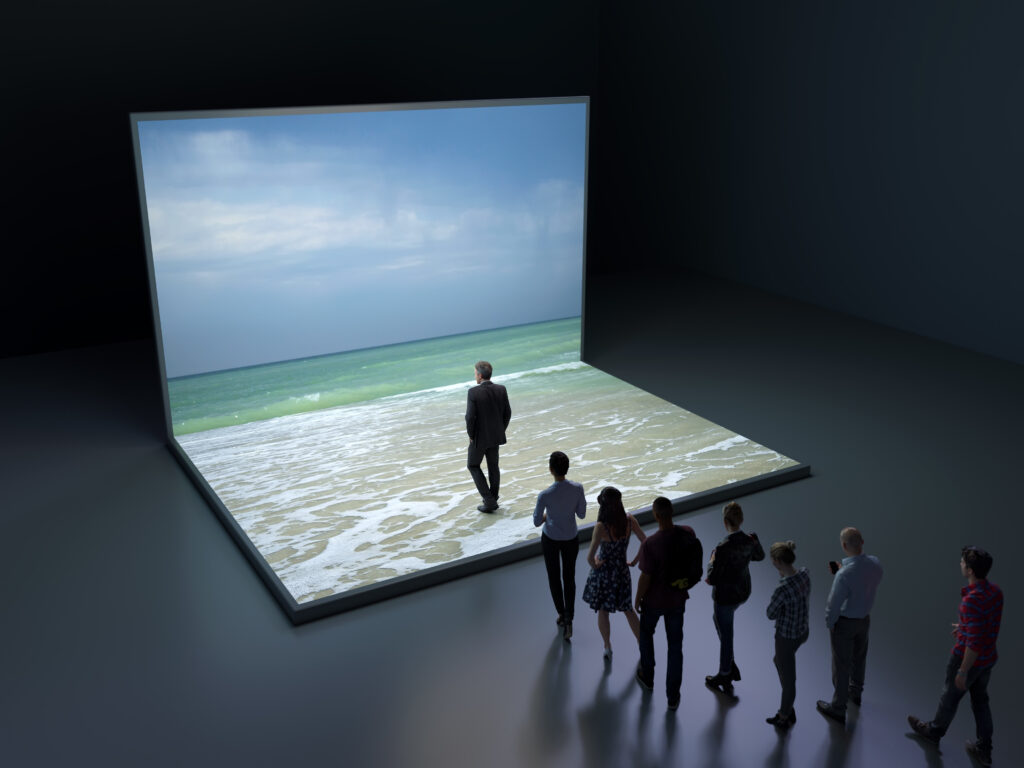 People walking into virtual sea