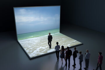 People walking into virtual sea
