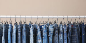 Rack with stylish jeans