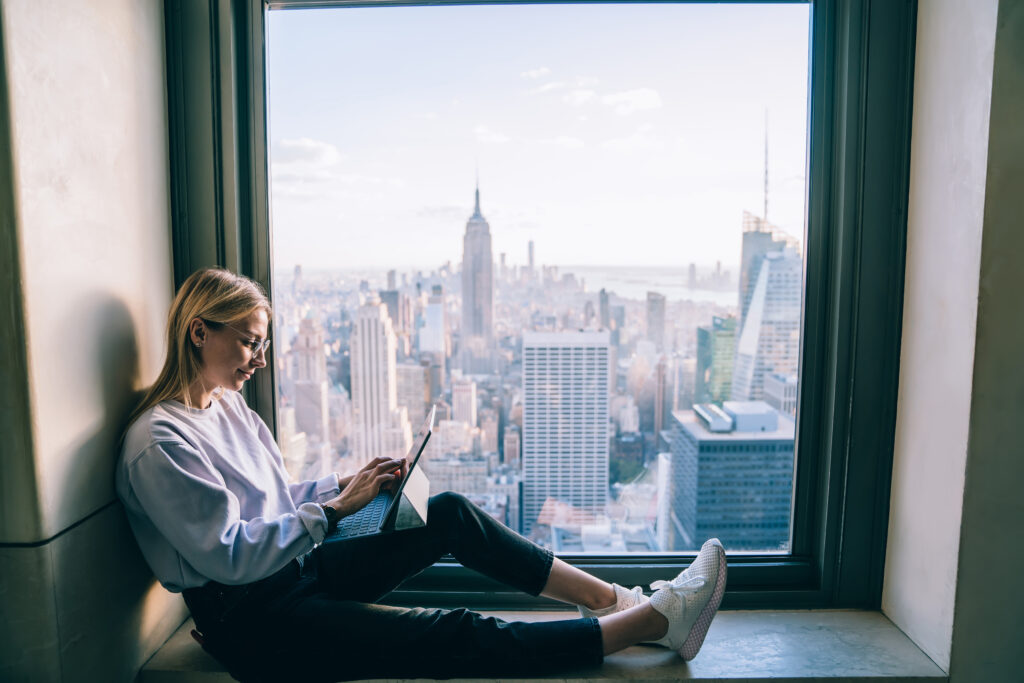 Remote working laptop woman New York