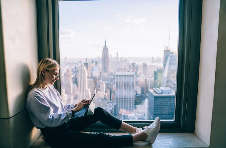 Remote working laptop woman New York