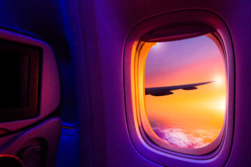 Aircraft window sunset