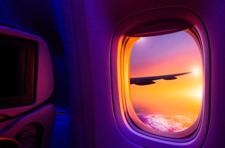 Aircraft window sunset