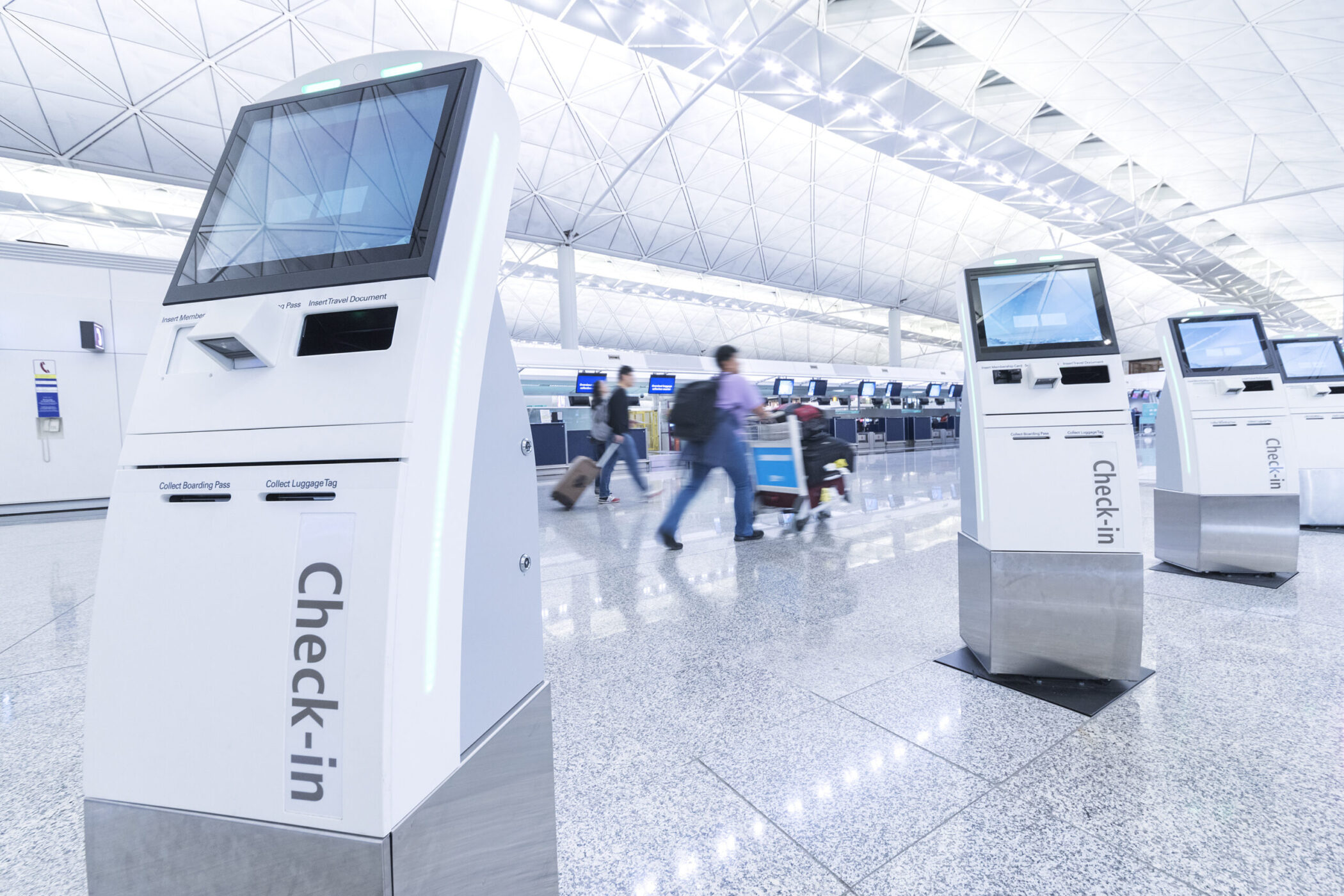 Self service machine and help desk kiosk at airport for check in, printing boarding pass or buying ticket