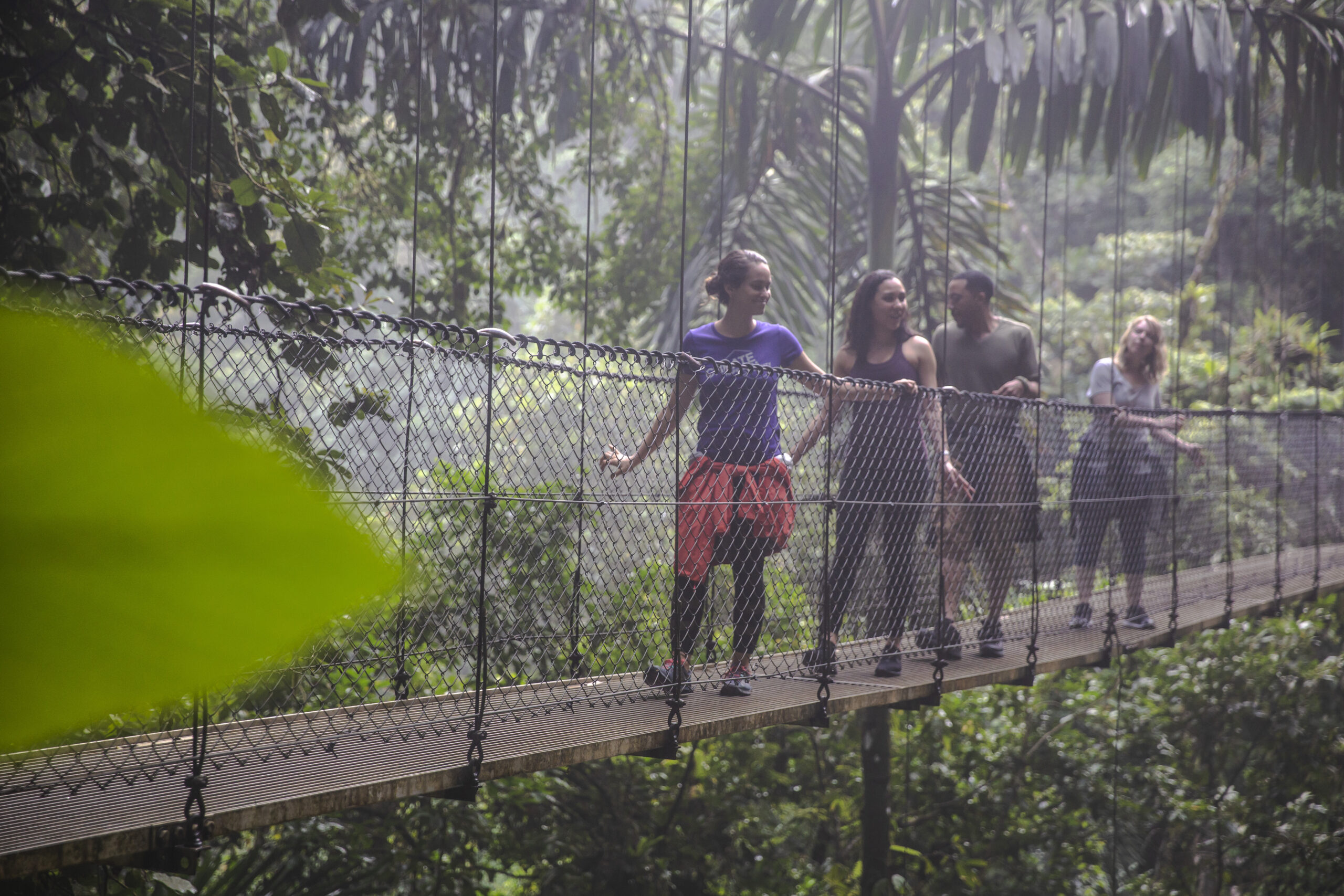 Crossing the Costa Rica Fortuna Suspension Bridge led by a G Adventures CEO