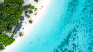 Beautiful aerial view of Maldives and tropical beach . Travel and vacation concept