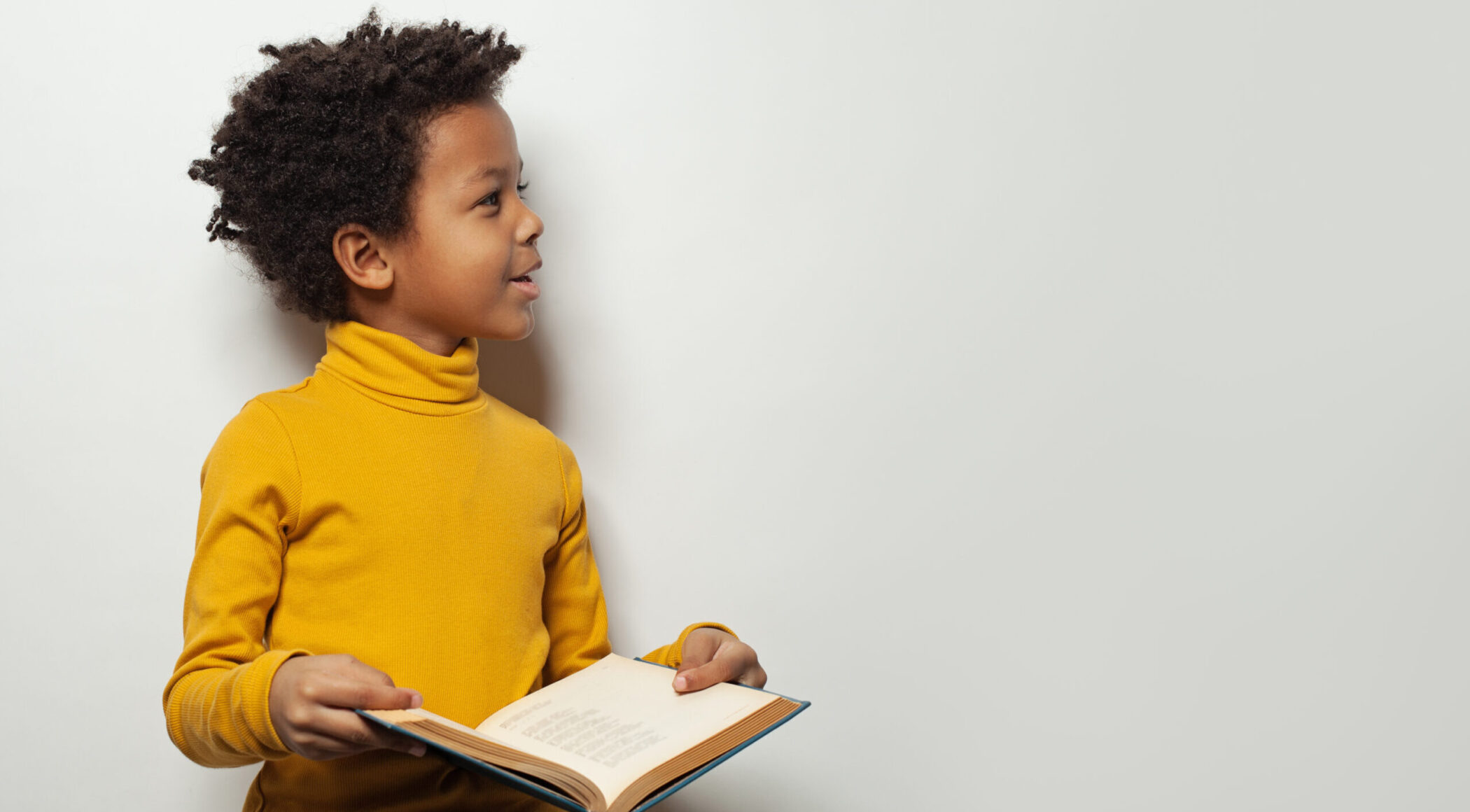 Child holding a book
