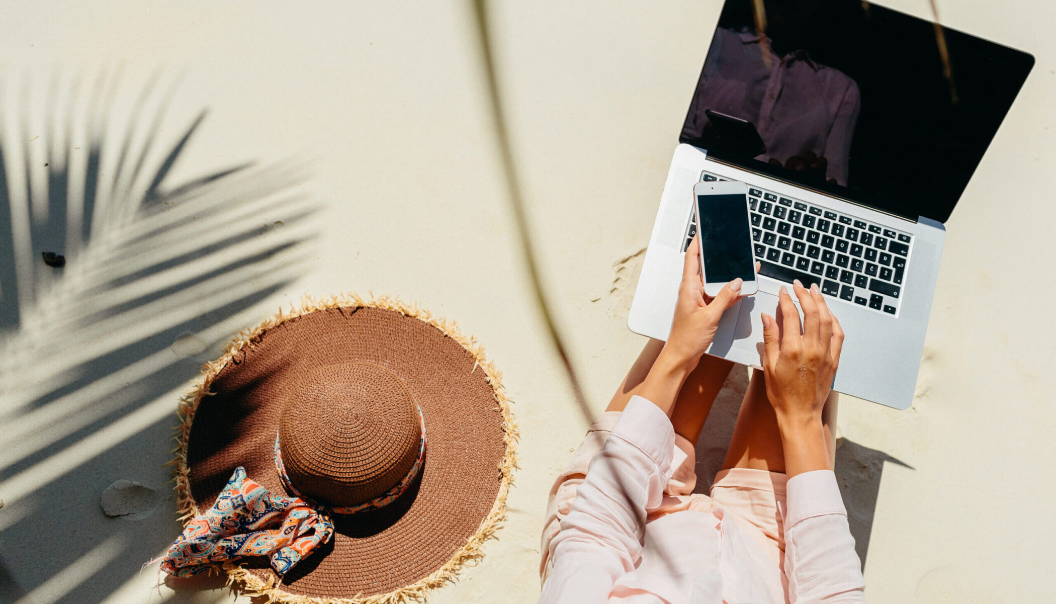 Digital nomad on beach