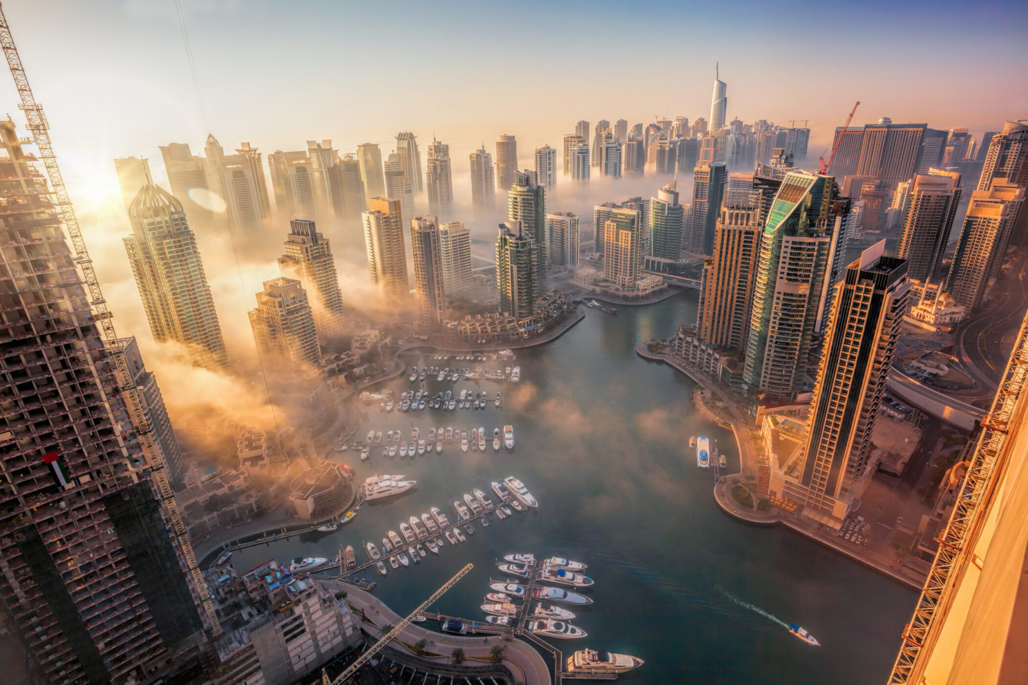 Dubai Marina with colorful sunset in Dubai, United Arab Emirates