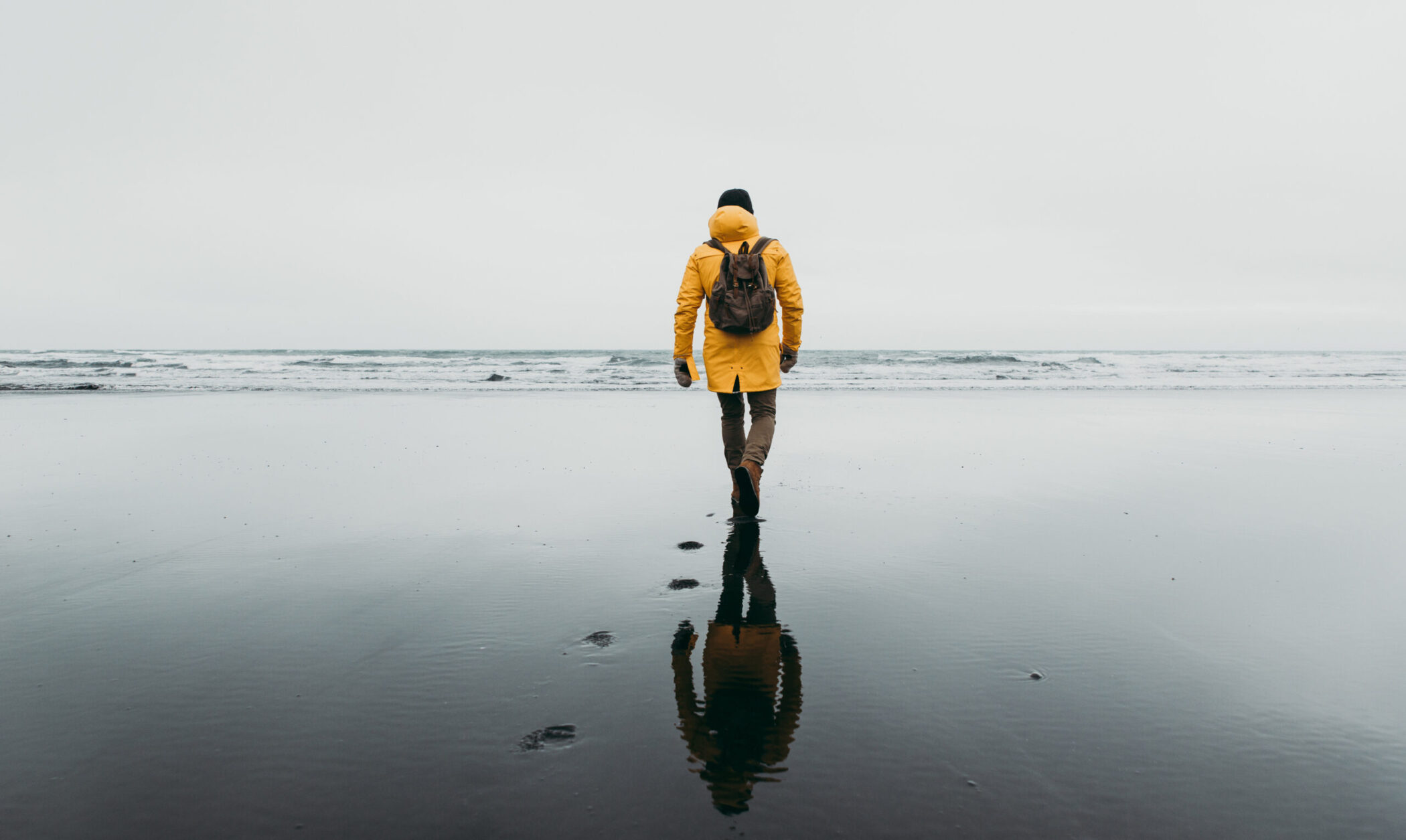 Walking along beach in Iceland