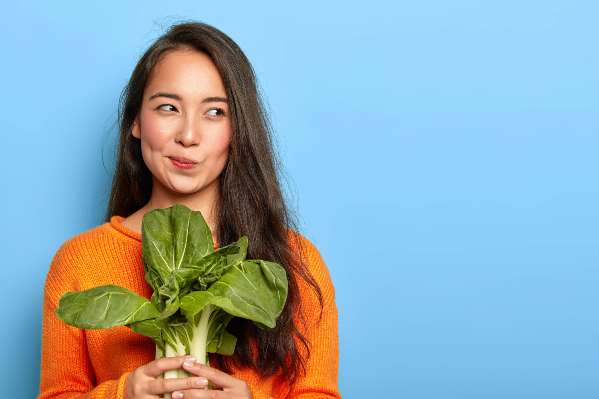 Woman holding plant