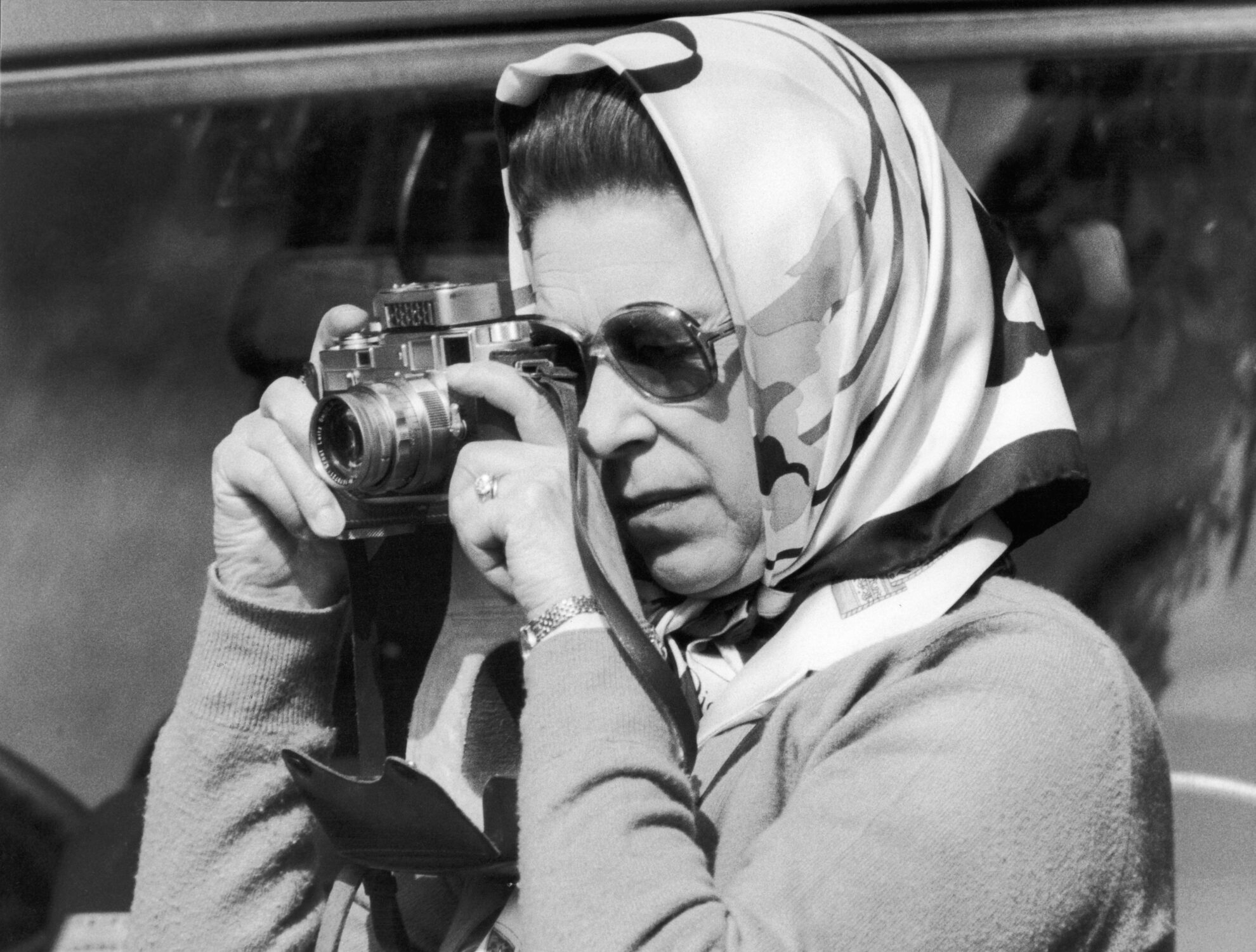 Her Majesty Queen Elizabeth II taking a picture at the Royal Windsor Horse Trials. 174th May 1982.