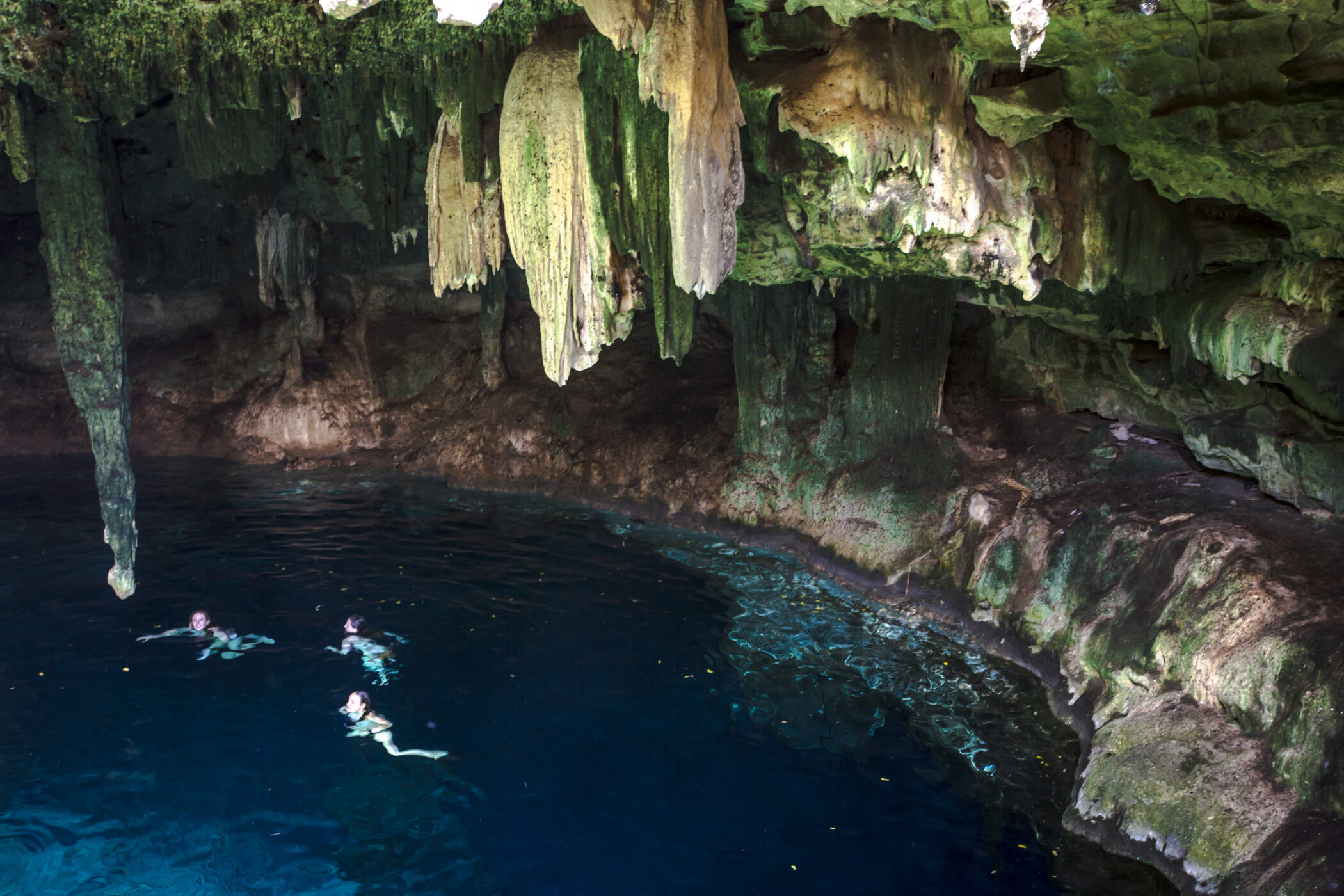 Mexico Merida Covered Cenote Female Travellers Swimming