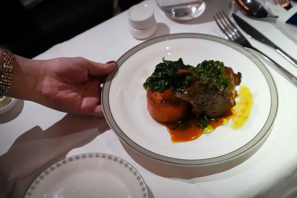 Slow Roasted Spring Lamb Cutlet with Gremolata and Rosemary Jus by Monica Galetti © Singapore Airlines